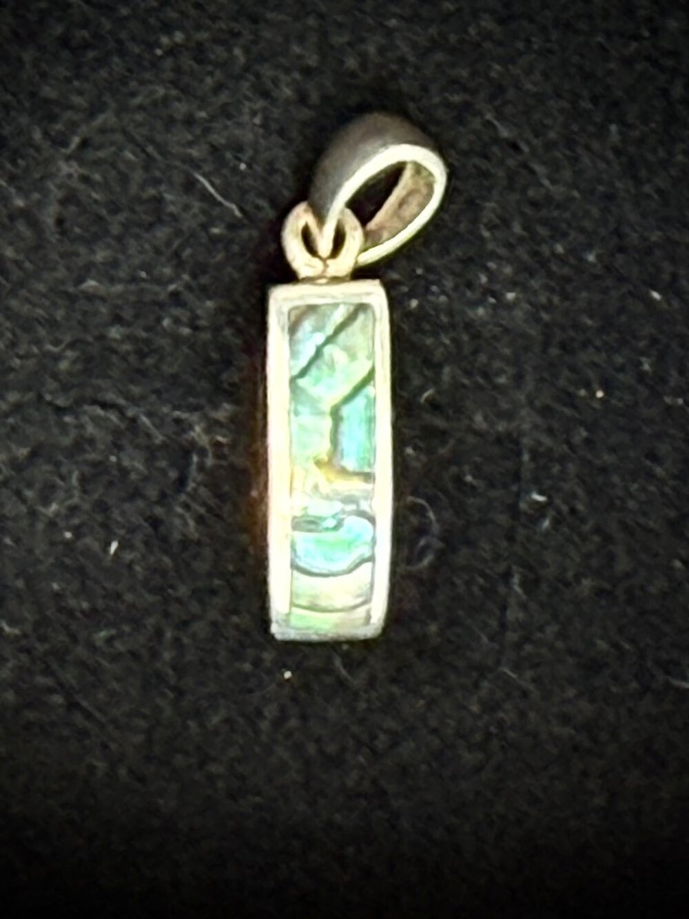 Authentic natural New Zealand paua shell sterling silver bezel frame pendant